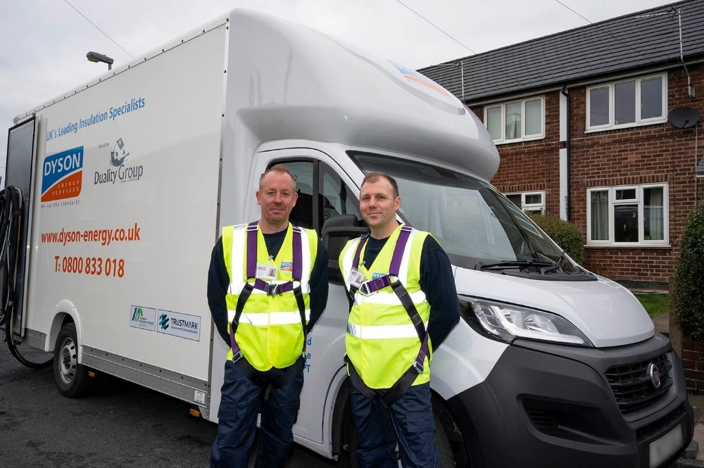 Dyson Energy Services installers outside customer home